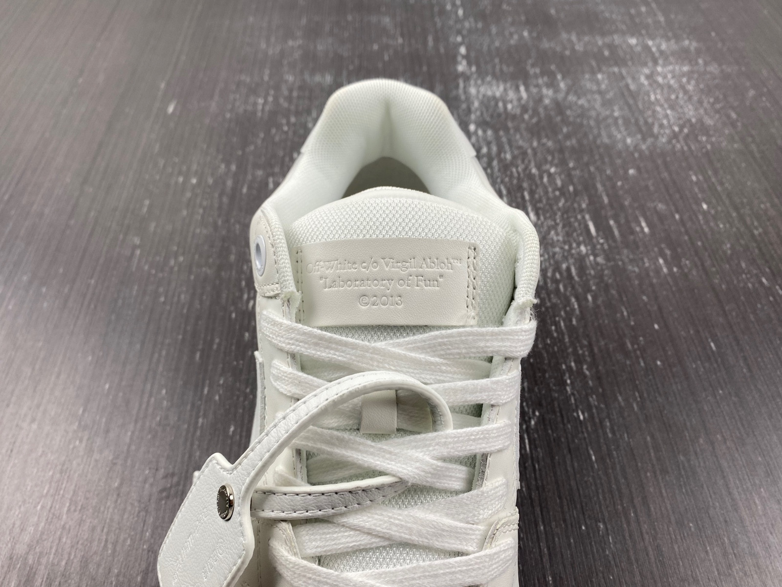 OF™ C/O VIRGIL ABLOH OUT OF OFFICE LOW-TOP LEATHER SNEAKERS ‘OOO“