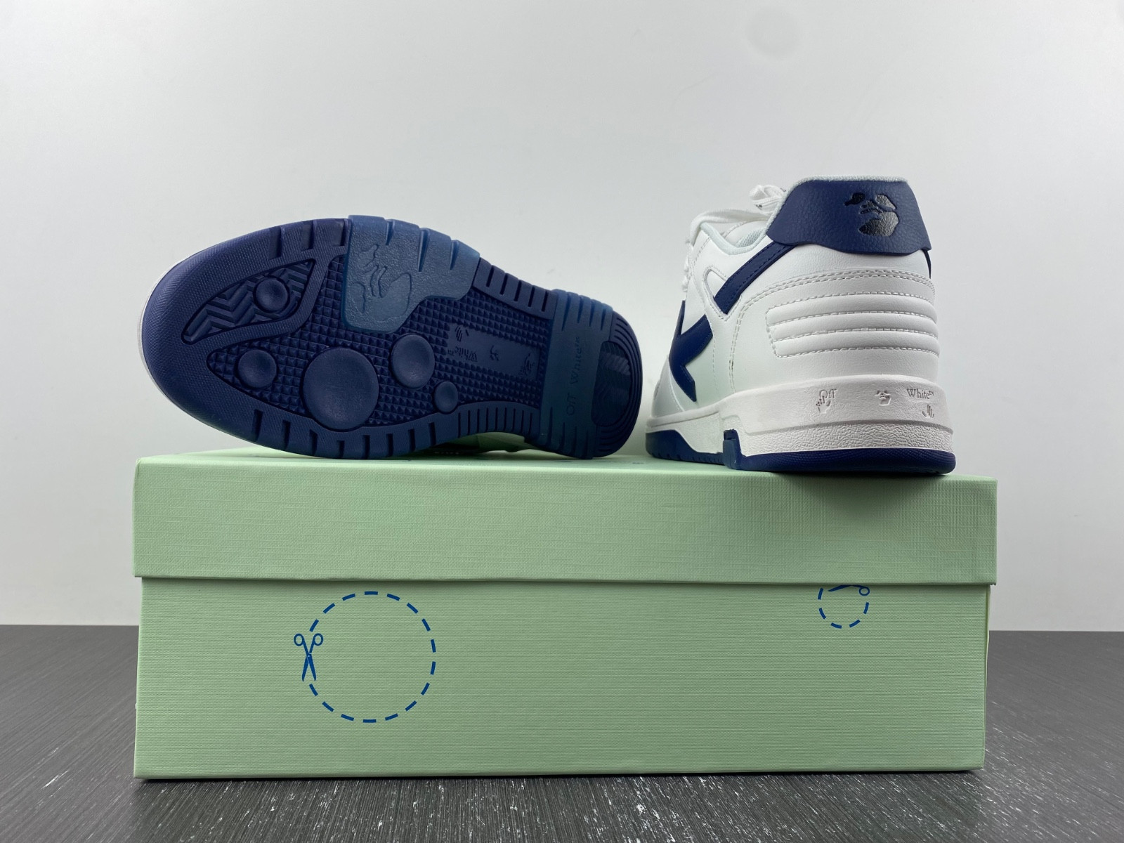 OF™ C/O VIRGIL ABLOH OUT OF OFFICE LOW-TOP LEATHER SNEAKERS ‘OOO“