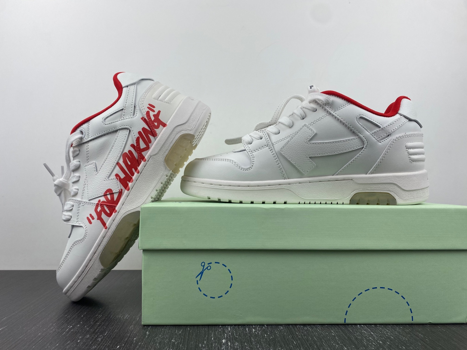 OF™ C/O VIRGIL ABLOH OUT OF OFFICE LOW-TOP LEATHER SNEAKERS ‘OOO“