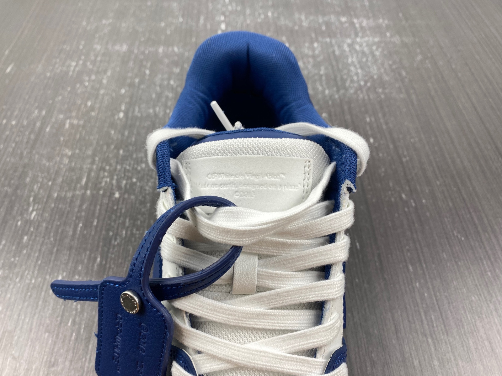OF™ C/O VIRGIL ABLOH OUT OF OFFICE LOW-TOP LEATHER SNEAKERS ‘OOO“