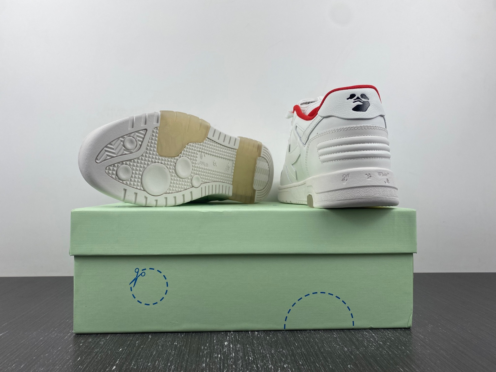 OF™ C/O VIRGIL ABLOH OUT OF OFFICE LOW-TOP LEATHER SNEAKERS ‘OOO“