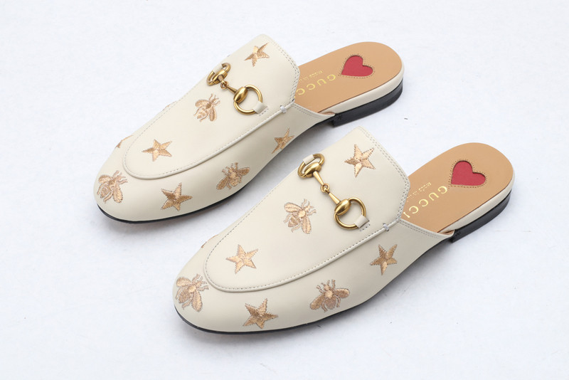 G*u*i sandals