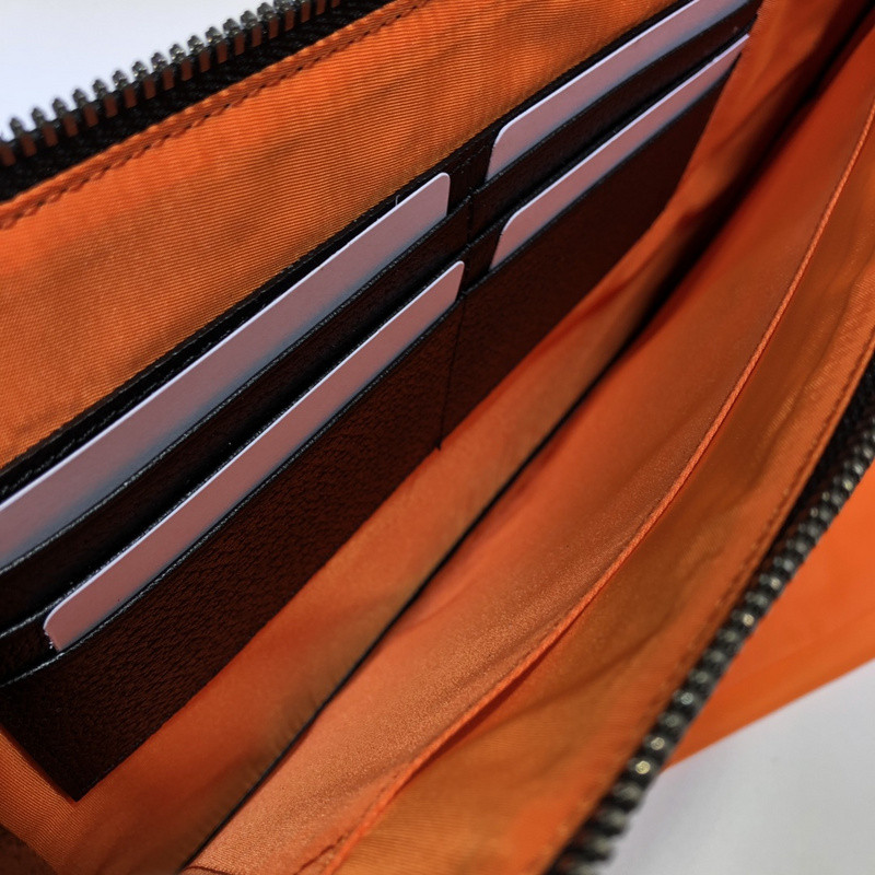 G*u*i clutch bag