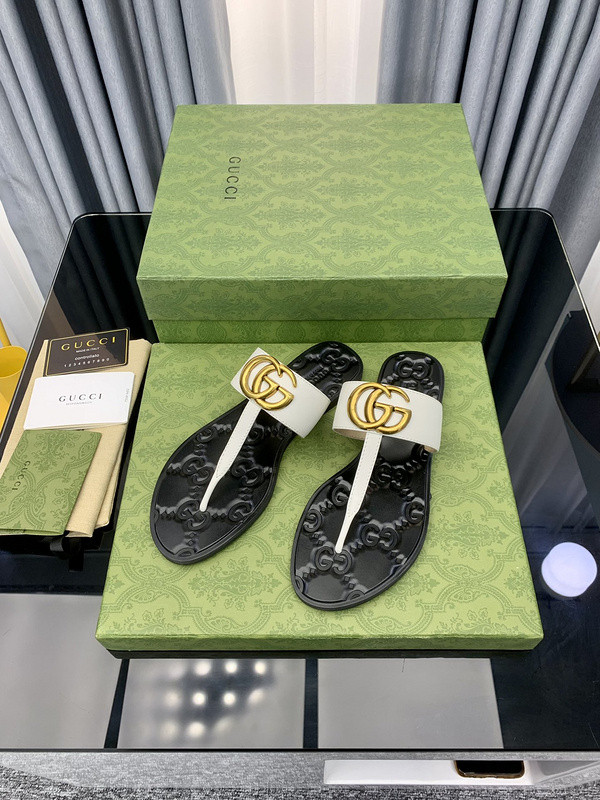 G*u*i sandals