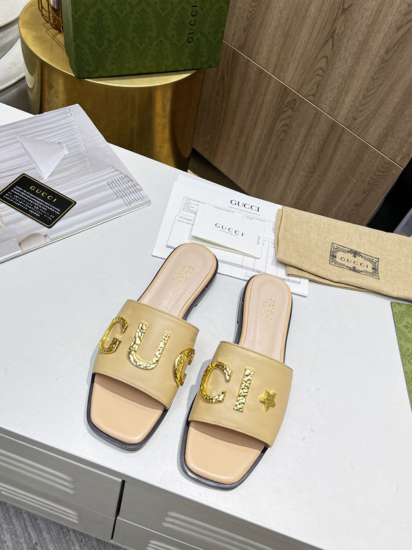 G*u*i sandals