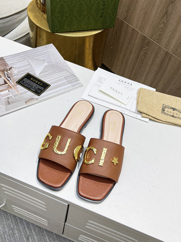 G*u*i sandals